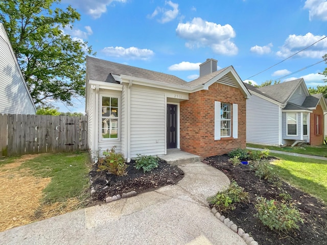 view of front of house with a front lawn