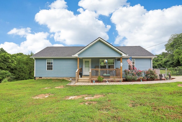 view of front of property with a front yard and a porch