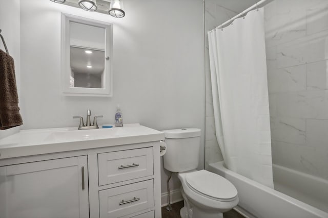 full bathroom featuring vanity, toilet, and shower / bath combo with shower curtain