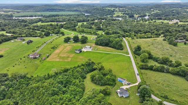 aerial view with a water view and a rural view