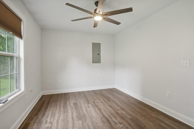 unfurnished room featuring ceiling fan, wood-type flooring, and electric panel