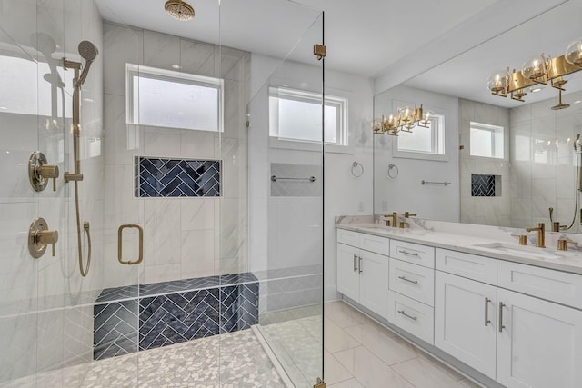 bathroom with an enclosed shower and vanity