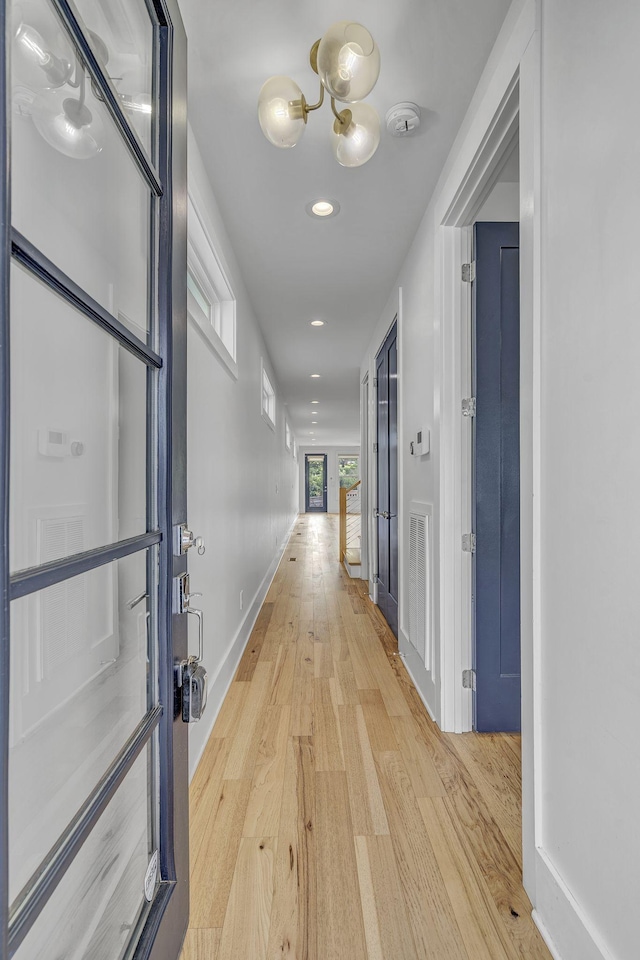 hall featuring light wood-type flooring