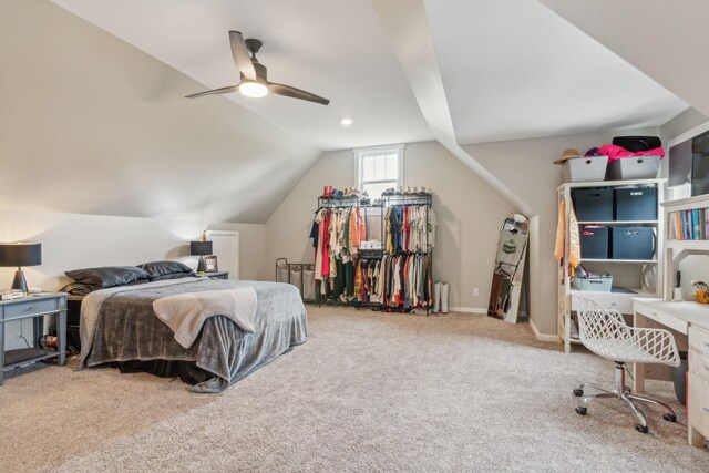 bedroom with lofted ceiling, light carpet, and ceiling fan