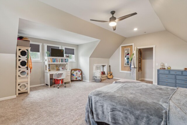 bedroom featuring carpet floors, lofted ceiling, and ceiling fan