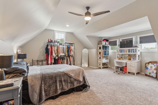 bedroom featuring carpet, ceiling fan, and lofted ceiling