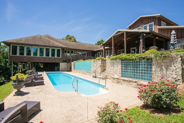 view of pool featuring a patio