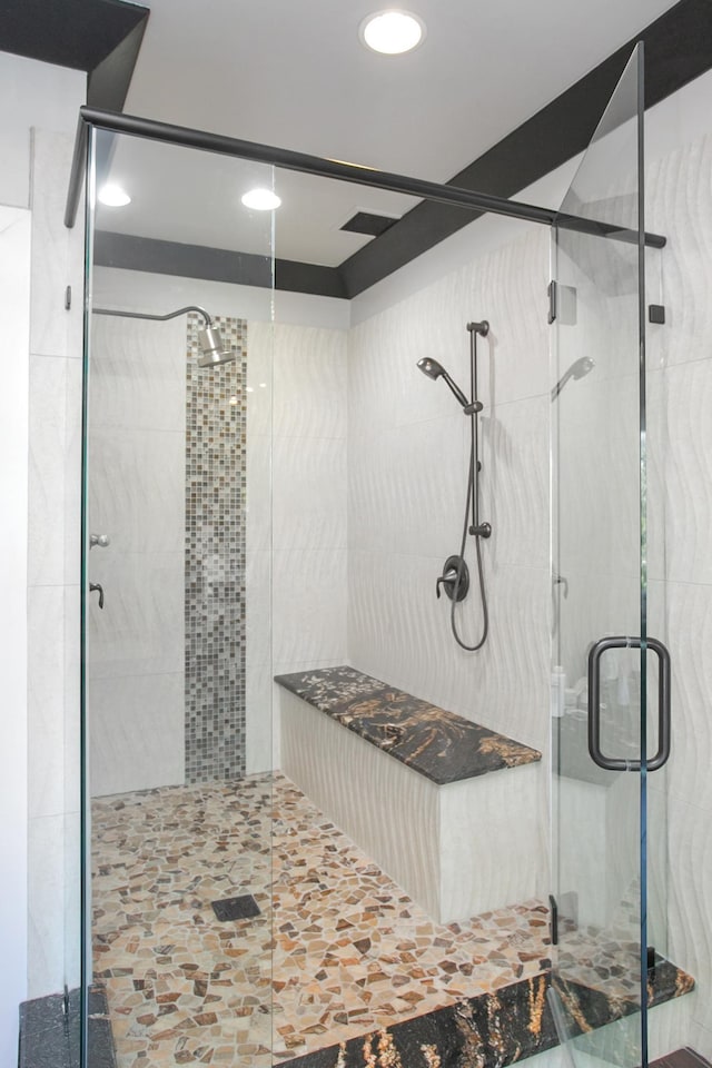 bathroom with an enclosed shower