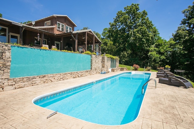 view of pool with a patio