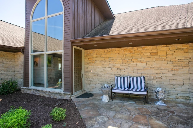 property entrance with a patio area