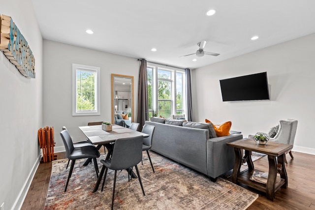 living room with ceiling fan, hardwood / wood-style flooring, and a healthy amount of sunlight