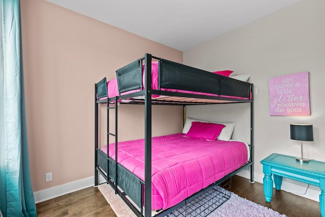 bedroom featuring dark hardwood / wood-style floors