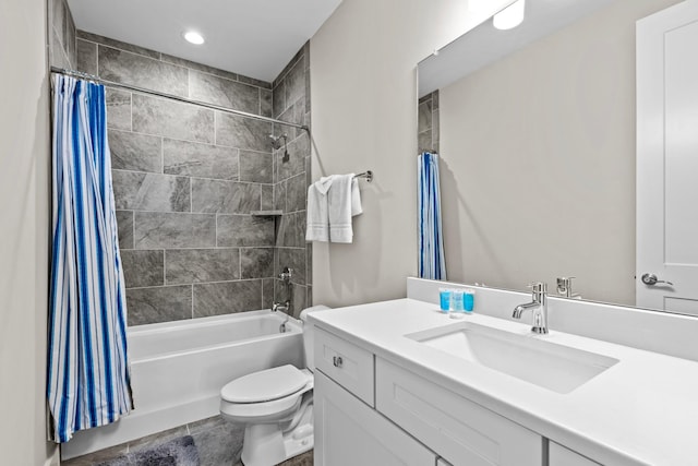 full bathroom with vanity, toilet, and shower / bath combo