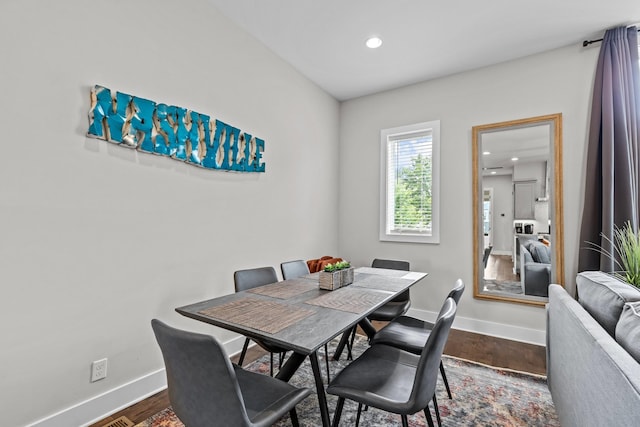 dining area with wood-type flooring