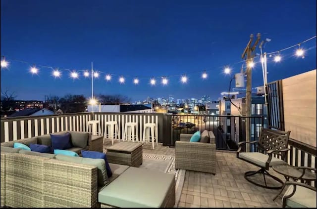 patio at night with an outdoor hangout area