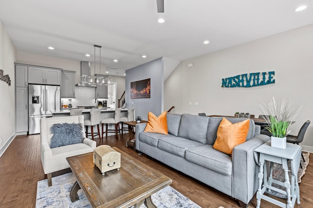 living room featuring dark hardwood / wood-style flooring