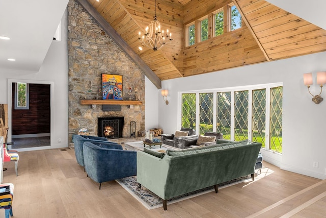 living room featuring high vaulted ceiling, a wealth of natural light, and a stone fireplace