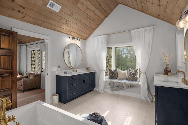 bathroom featuring tile patterned floors, vanity, wood ceiling, and vaulted ceiling