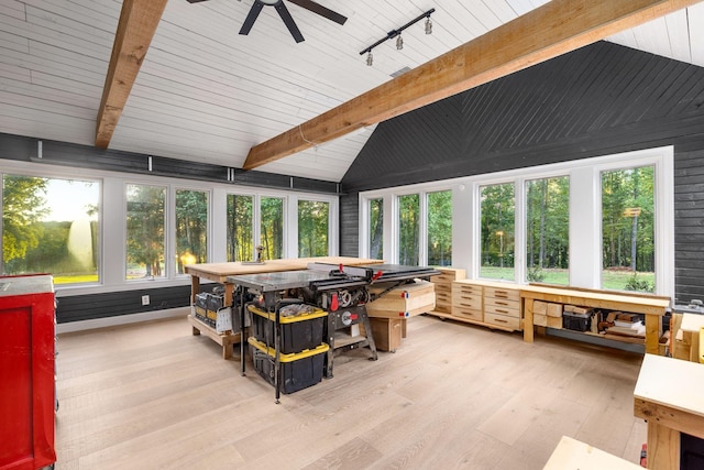 sunroom / solarium with vaulted ceiling with beams, ceiling fan, and track lighting