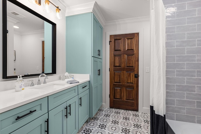 bathroom with shower / bath combination with curtain, vanity, and ornamental molding