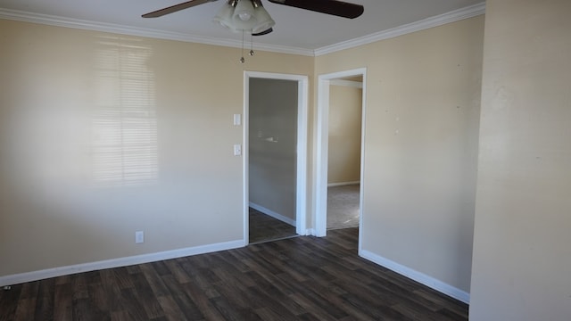 empty room with dark hardwood / wood-style floors, crown molding, and ceiling fan