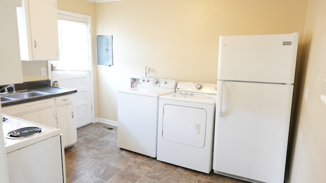 washroom with sink, light tile patterned flooring, and electric panel