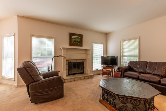 carpeted living room with ornamental molding