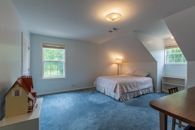 carpeted bedroom featuring vaulted ceiling