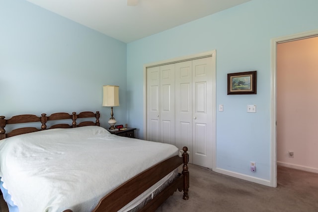 bedroom featuring a closet, ceiling fan, and dark carpet