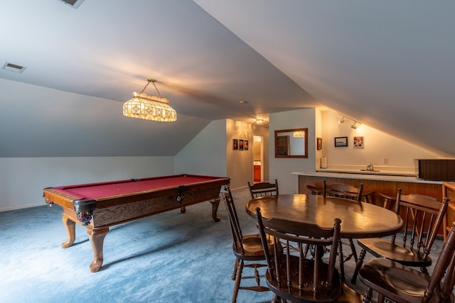 recreation room with vaulted ceiling, pool table, bar, and carpet floors