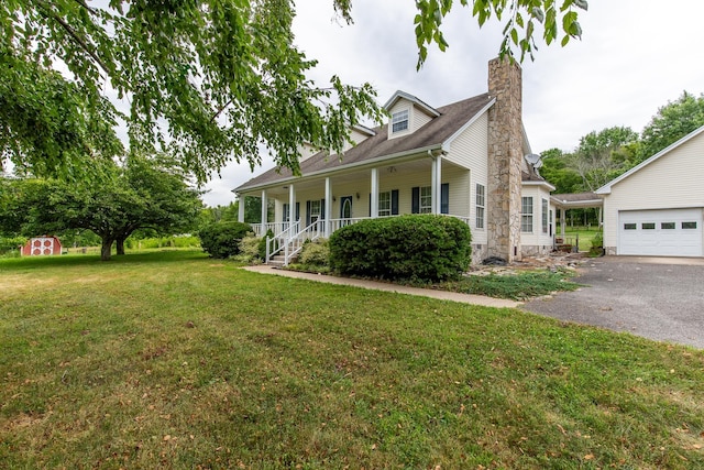 160 Sinking Creek Rd, Petersburg, TN 37144 - cape cod home featuring covered porch, a garage, a front yard, a chimney, and asphalt driveway