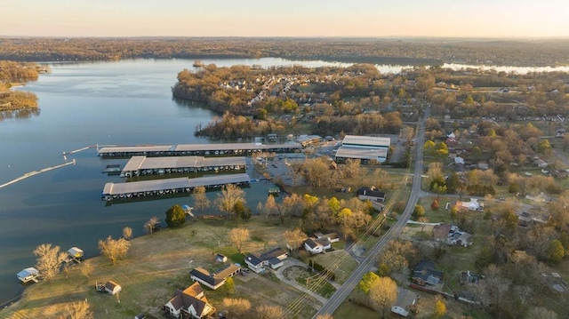 aerial view at dusk with a water view