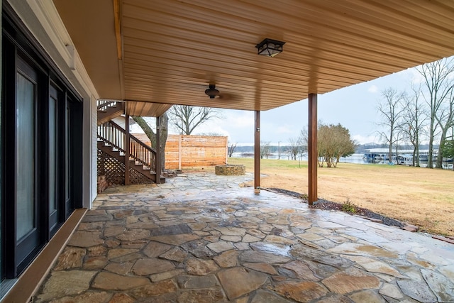 view of patio featuring a water view