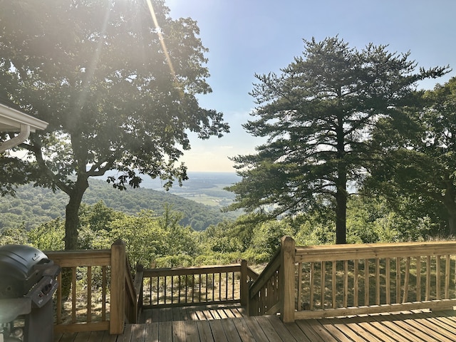 wooden deck with area for grilling