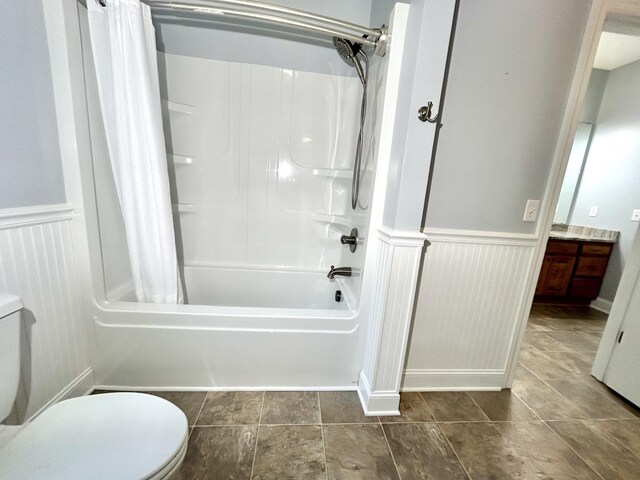 full bathroom featuring vanity, tile patterned floors, toilet, and shower / bath combination with curtain