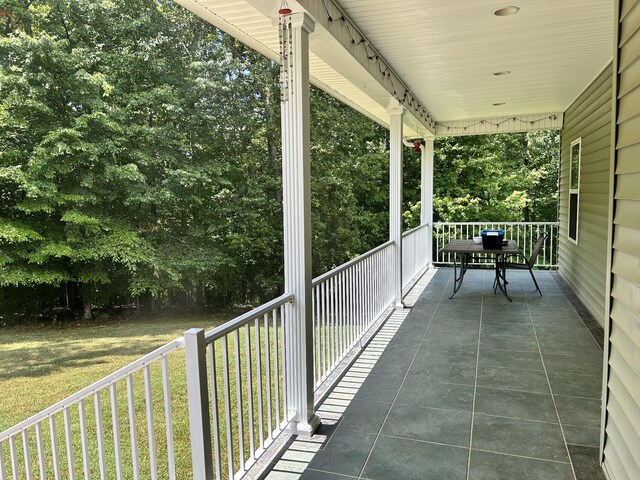 balcony featuring a porch