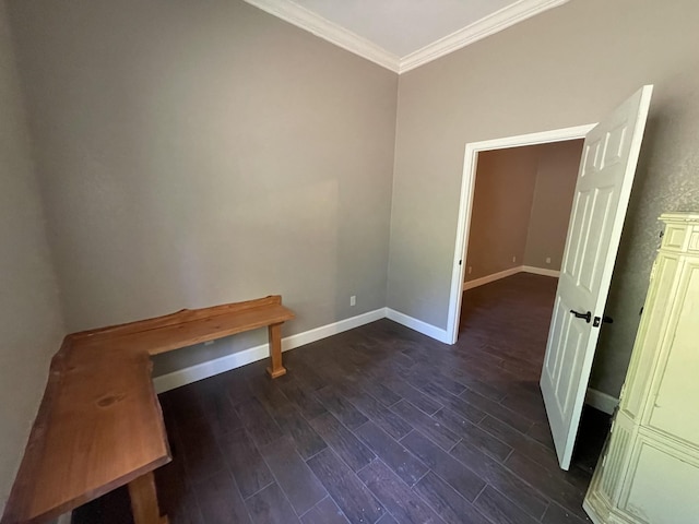 interior space with crown molding and dark wood-type flooring