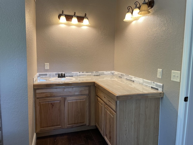 bathroom featuring vanity and wood-type flooring