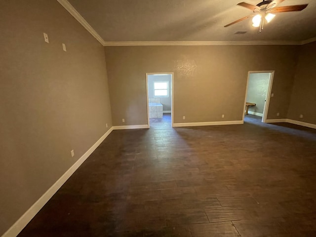 spare room with ceiling fan, dark hardwood / wood-style flooring, and ornamental molding