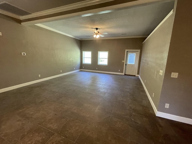 spare room featuring ceiling fan and crown molding