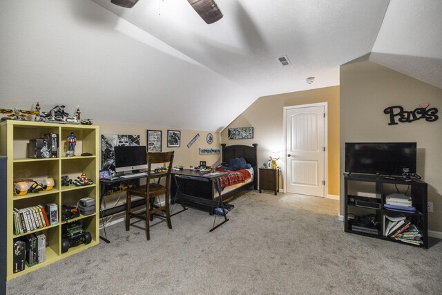 carpeted bedroom with ceiling fan and lofted ceiling