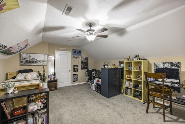 carpeted bedroom with a textured ceiling, ceiling fan, and vaulted ceiling