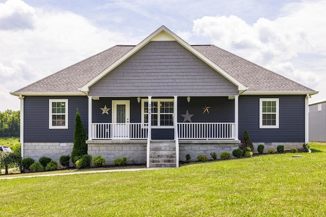 view of front of property with a porch and a front yard