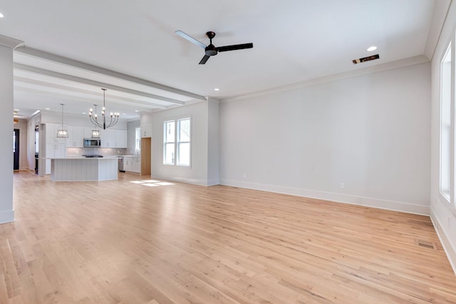 unfurnished living room with ornamental molding, light hardwood / wood-style floors, and ceiling fan with notable chandelier