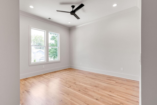 unfurnished room featuring ceiling fan and light hardwood / wood-style floors