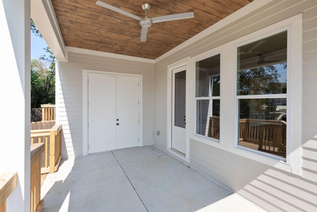 view of patio featuring ceiling fan