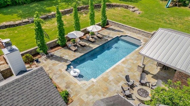 view of swimming pool featuring a patio