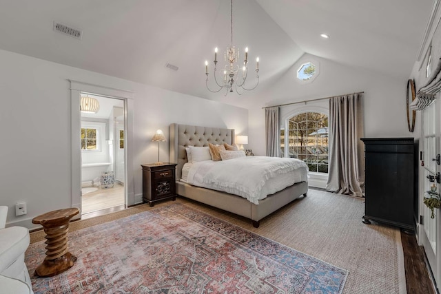 bedroom with a chandelier, vaulted ceiling, and wood-type flooring