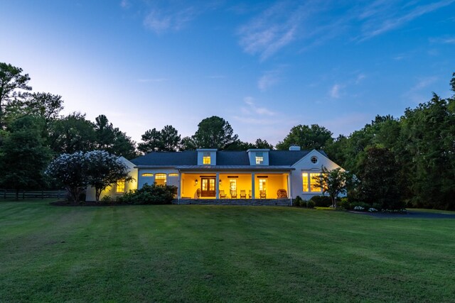 view of front of property with a front lawn