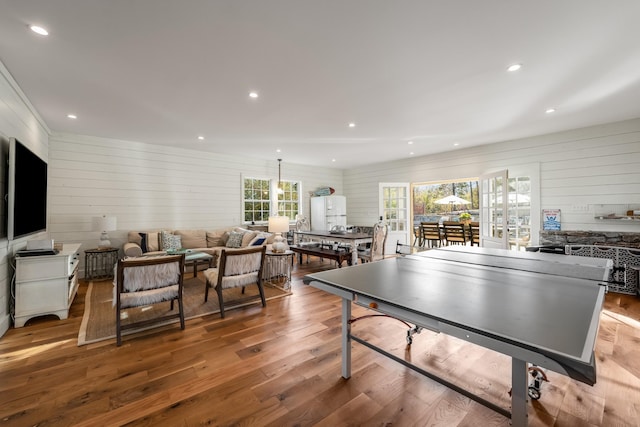 game room with wood-type flooring